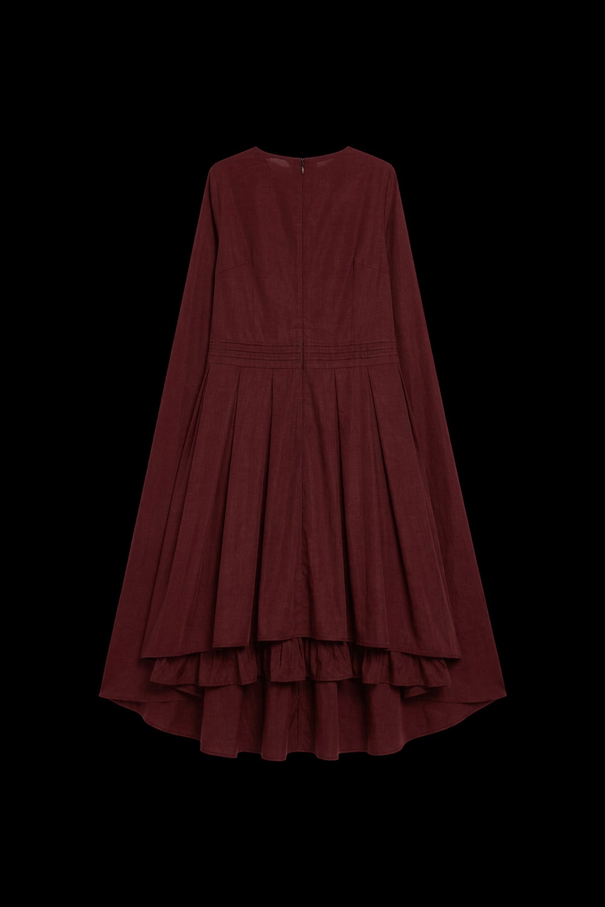 A long-sleeved, high-low tiered dress in a deep burgundy red, shown against a solid black background.