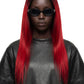 A model with long, straight black hair featuring vibrant red ombre ends, wearing black sunglasses and a black leather top against a solid white background.