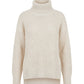 A cream-colored waffle-knit turtleneck sweater with long sleeves, shown against a plain white background.