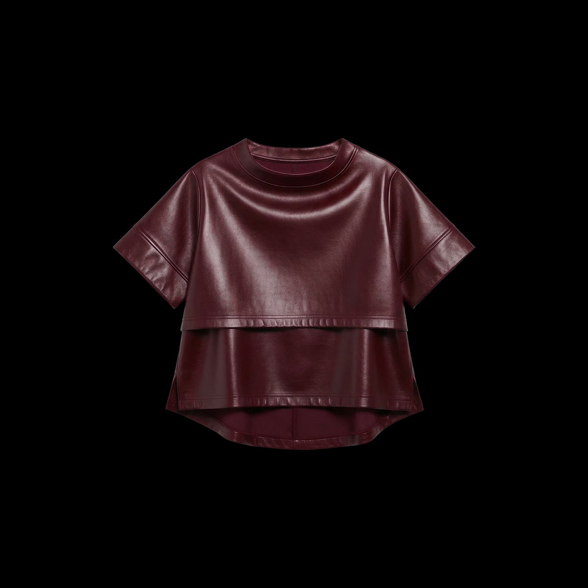 Women's burgundy faux leather cropped top with short sleeves and a layered, double-hem detail.