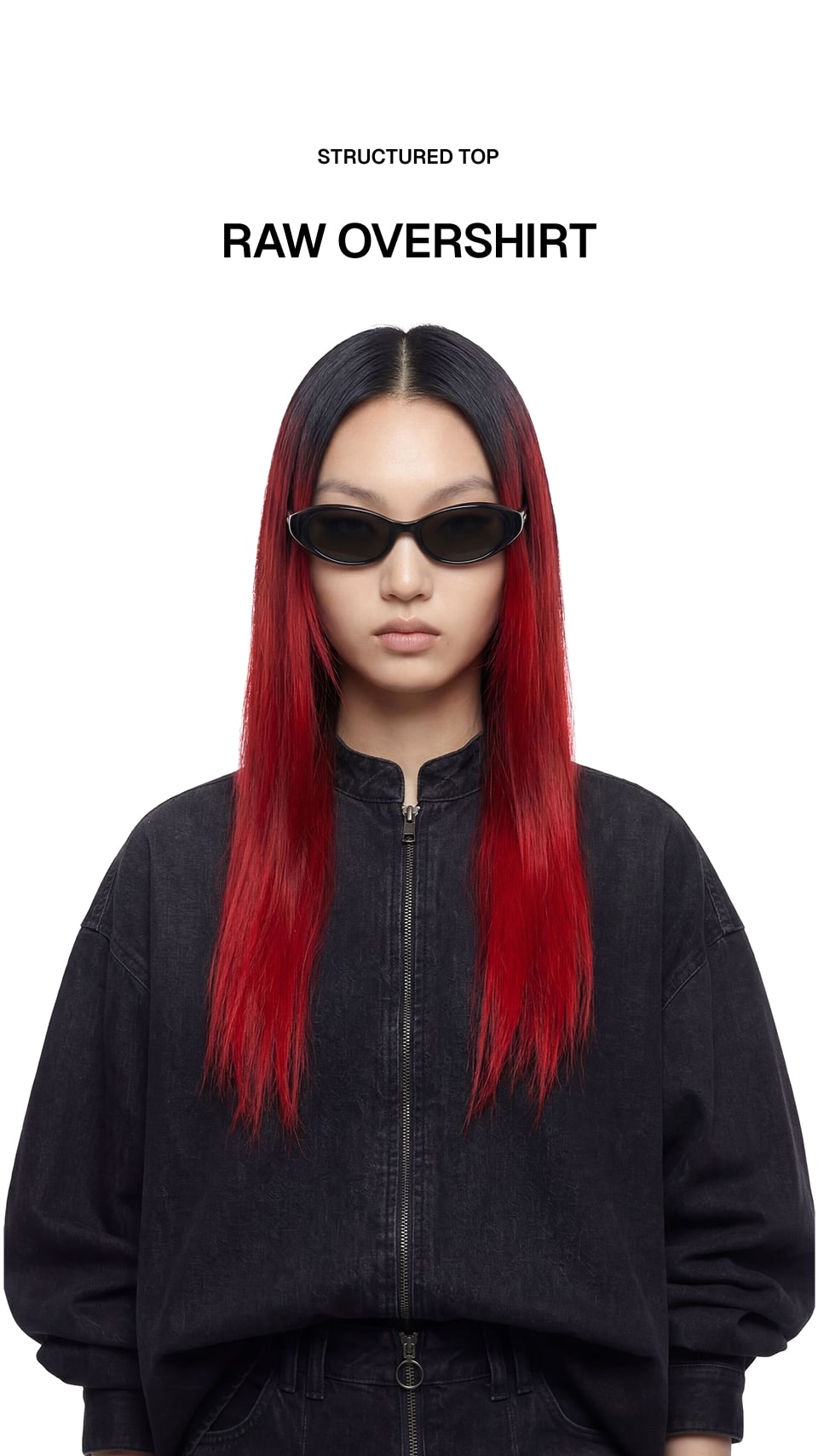 A model with long black-to-red ombre hair wearing a black zip-up raw-edge overshirt and black sunglasses, set against a plain white background with text reading 'STRUCTURED TOP RAW OVERSHIRT'.